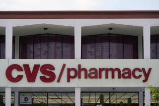 A sign marks a CVS branch on Tuesday, May 16, 2023, in Pasadena, Calif. Nevada Attorney General Aaron Ford announced his office secured nearly $152 million over the next decade in a settlement against CVS in opioid claims, the largest sum that the state has brought in by itself in opioid-related litigation. (AP Photo/Marcio Jose Sanchez)