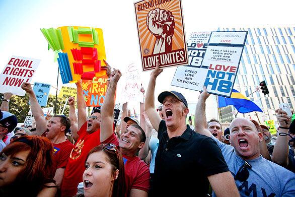 About 10,000 people gathered Saturday along Spring Street in downtown Los Angeles to protest the passage Proposition 8, the ballot measure that banned same-sex marriage in California.