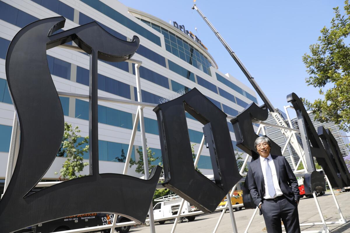 Dr. Patrick Soon-Shiong in front of The Times' building in El Segundo
