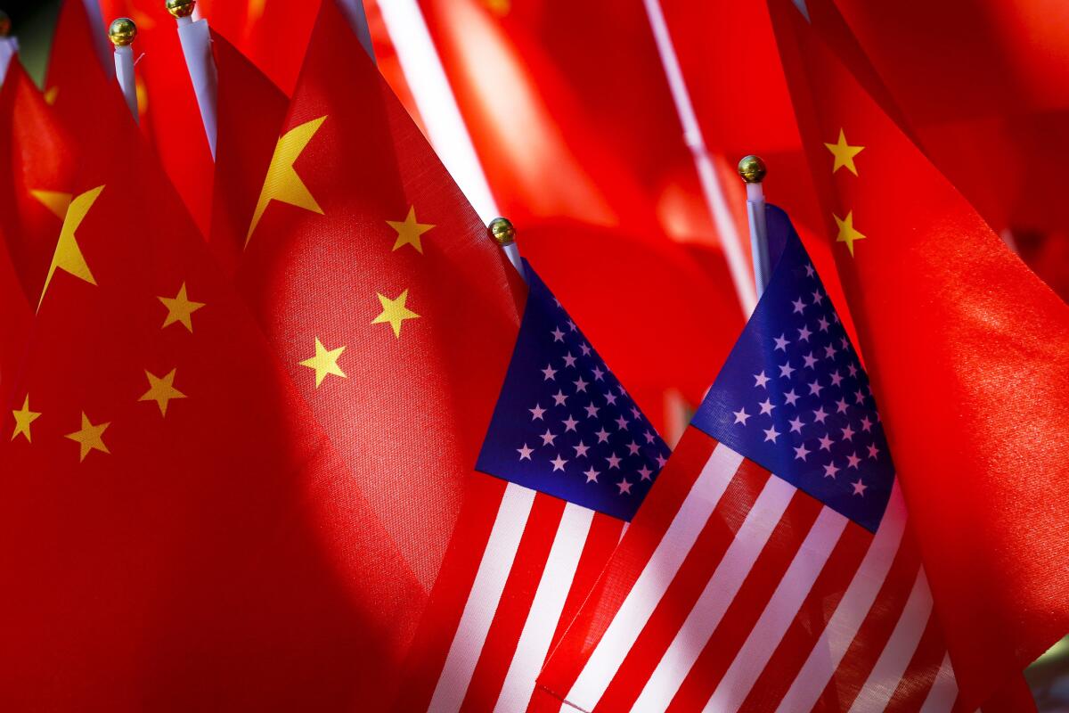 American flags are displayed together with Chinese flags