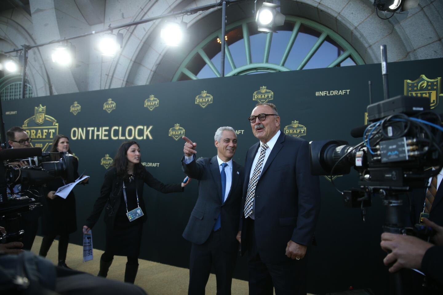 Chicago Mayor Rahm Emanuel and Dick Butkus arrive at the "Gold Carpet" at the Auditorium Theater for the 2015 NFL draft.