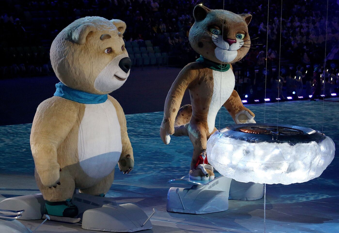 The Sochi Olympics mascots appear during the 2014 Winter Olympics Closing Ceremony.