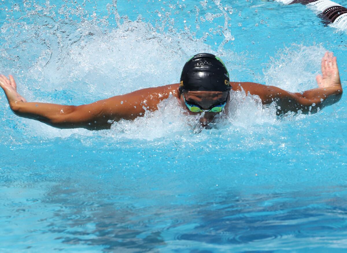 Edison High School's Holden Lee competes in the boys' 100 yard butterfly on Saturday.