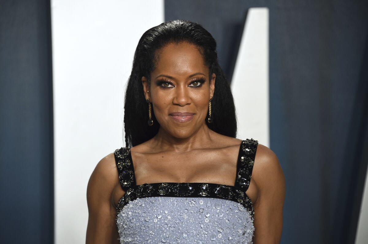 FILE _ In this Feb. 9, 2020 file photo, Regina King arrives at the Vanity Fair Oscar Party in Beverly Hills, Calif. King is receiving awards season buzz for her new film "One Night in Miami," which debuted at the Venice Film Festival and tells a fictional story about four prominent Black Americans gathered in a hotel room in 1964 who emerge determined to change the world. (Photo by Evan Agostini/Invision/AP, File)