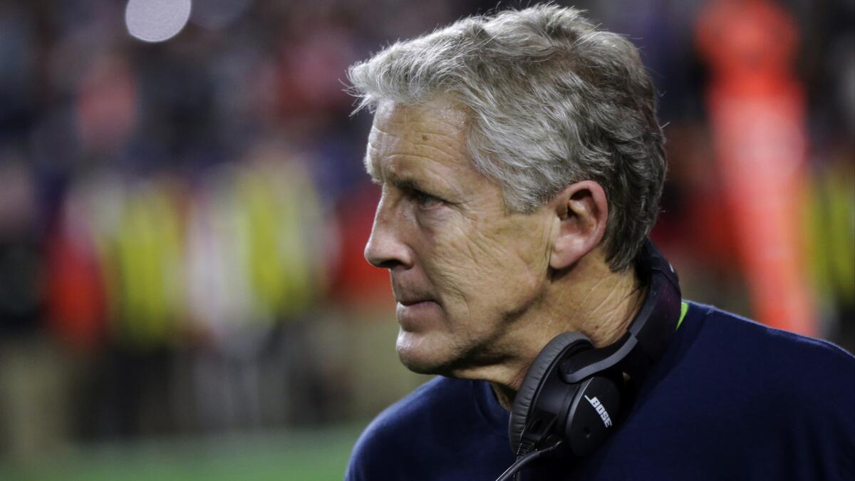 Seahawks Coach Pete Carroll watches from the sideline during the second half of Seattle's 28-24 loss to the New England Patriots in Super Bowl XLIX on Sunday.
