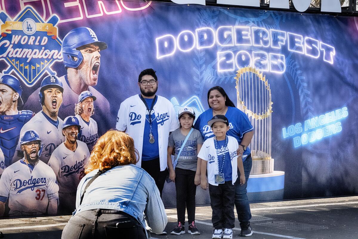 Los Angeles Dodger fans take selfies at DodgerFest at Dodge