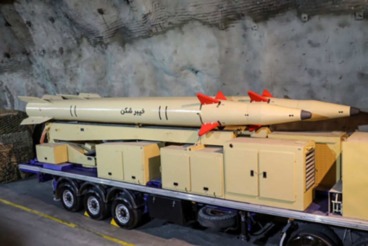In this photo released Wednesday, Feb. 9, 2022, by Sepahnews of the Iranian Revolutionary Guard, surface-to-surface "Khaibar-buster" missile is displayed in an undisclosed location in Iran. On Wednesday, Feb. 9, 2022, Iranian state TV unveiled a new missile with solid fuel and a range of 1,450 kilometers, or 900 miles that would allow it to reach both U.S. bases in the region as well as targets inside its archfoe Israel. (Sepahnews via AP)