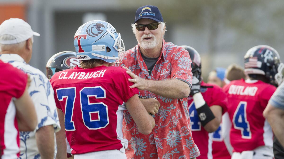 Brethren Christian High coach Pat McInally, shown coaching the South team in the 58th annual Orange County All-Star Classic on June 30, retired as the Brethren Christian football program was eliminated.