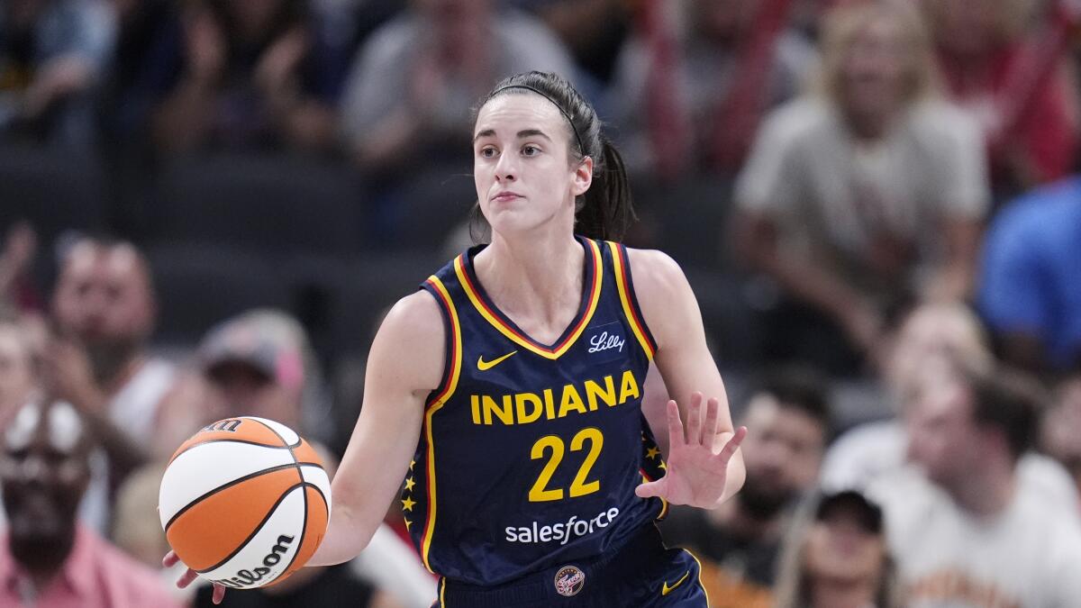Indiana Fever guard Caitlin Clark drives up court in a game earlier this month.