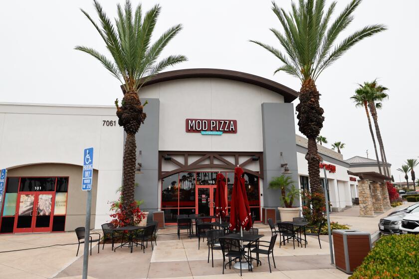 HUNTINGTON BEACH, CA - JULY 09: Mod Pizza exteriors on Tuesday, July 9, 2024 in Huntington Beach, CA. The fast-casual restaurant chain is preparing a potential bankruptcy filing. (Allen J. Schaben / Los Angeles Times)