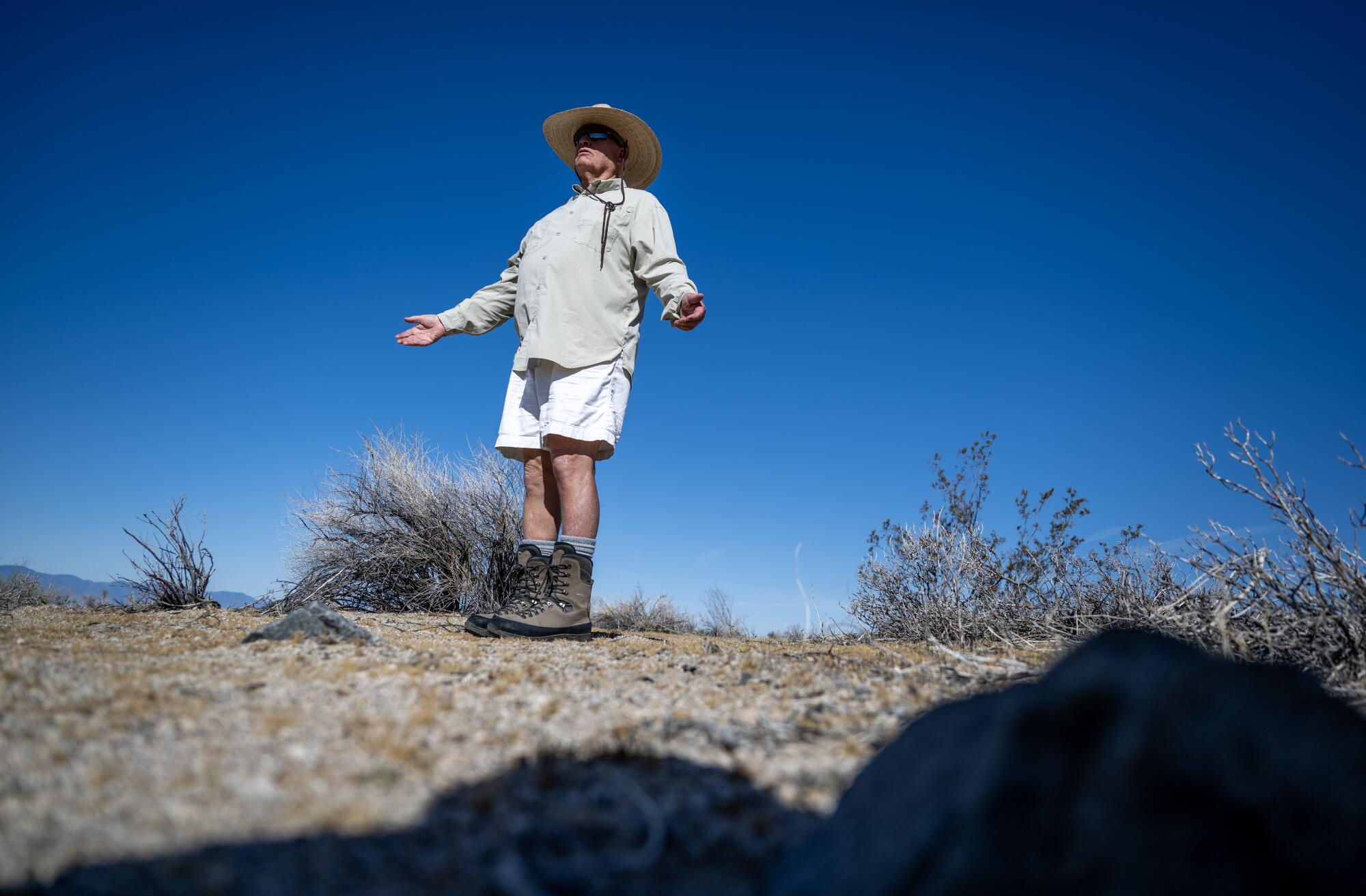 Jim Cornett at his study site filled with dead ironwood trees and barely surviving ocotillos.