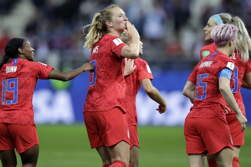 United States' scorer Samantha Mewis, center, and her teammates celebrate their side's 4rth goal during the Women's World Cup Group F soccer match between United States and Thailand at the Stade Auguste-Delaune in Reims, France, Tuesday, June 11, 2019. (AP Photo/Alessandra Tarantino)