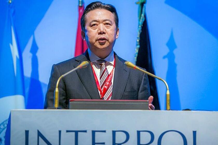 HANDOUT EDITORIAL USE ONLY/NO SALES Mandatory Credit: Photo by INTERPOL/HANDOUT/EPA-EFE/REX (9917034a) (FILE) - A handout image made available by INTERPOL showing Meng Hongwei, Chinese President of Interpol, speaking in Bali, Indonesia (reissued 07 October 2018). Reports on 07 October 2018 state that the INTERPOL General Secretariat in Lyon, France has received the resignation of Mr Meng Hongwei as President of INTERPOL with immediate effect. Under the terms of INTERPOL?s Constitution and internal regulations, the Senior Vice-President serving on INTERPOL?s Executive Committee, Mr Kim Jong Yang of South Korea, becomes the Acting President. INTERPOL has received the resignation of Mr Meng Hongwei as President, Bali, Indonesia - 10 Nov 2016 ** Usable by LA, CT and MoD ONLY **