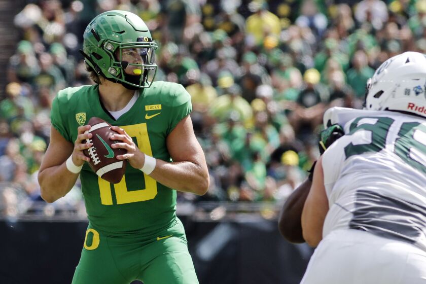 FILE - In this Sept. 8, 2018, file photo, Oregon quarterback Justin Herbert (10) looks for a receiver against Portland State during an NCAA college football game in Eugene, Ore. A couple of Pac-12 stars have a chance to put themselves into the Heisman mix on Saturday night when No. 7 Stanford visits No. 20 Oregon. Herbert has put up nice numbers in the first three weeks of the season, with 10 touchdown passes, no interceptions and 10.4 yards per attempt. He is not quite at the Tua level, but hes not that far off. (AP Photo/Thomas Boyd, File)