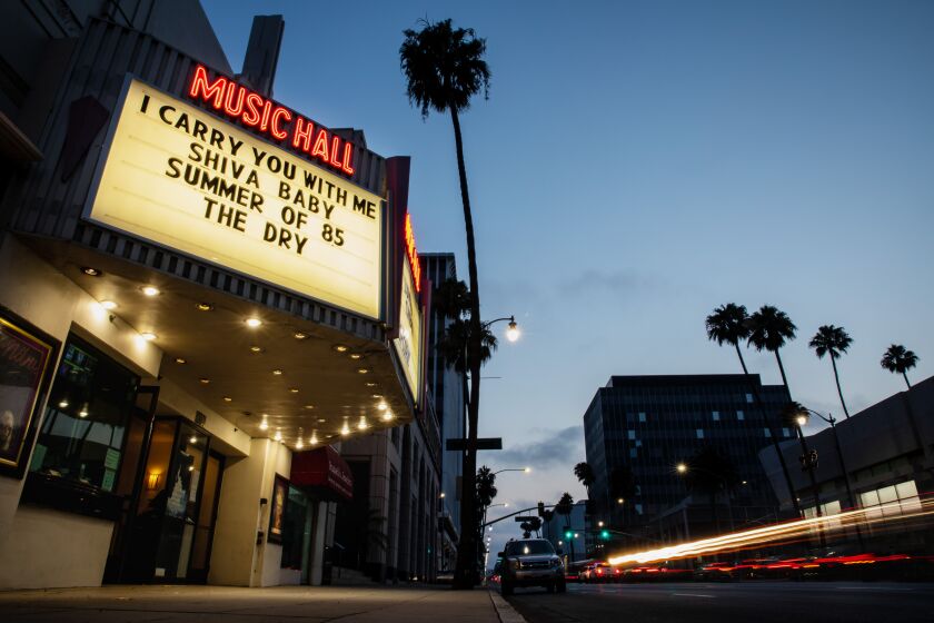 Beverly Hills, CA - July 12: The Lumiere Cinema at The Music Hall, on Wilshire Blvd, Beverly Hills, CA, is known for showing independent films, like "I Carry You With Me," "Shiva Baby," "Summer of 85," and "The Dry," as seen on their marquee, July 12, 2021. The independent theater boasts that they are the only movie house in Beverly Hills. (Jay L. Clendenin / Los Angeles Times)