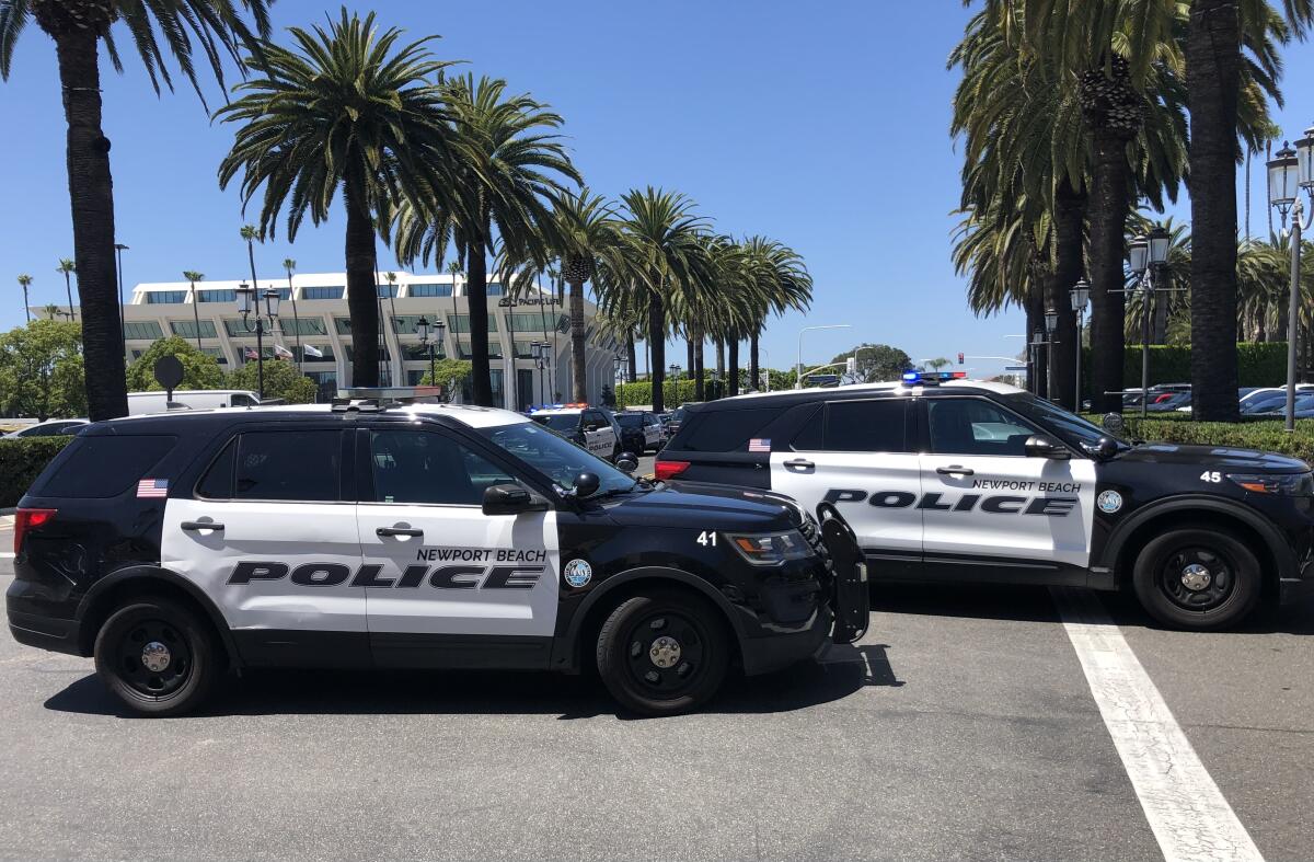 Several Newport Beach Police Department vehicles blocked the entrances to Fashion Island early Thursday afternoon.