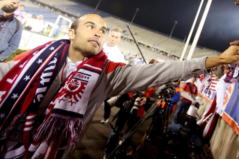 Landon Donovan acknowledges the fans after playing in his final match for the U.S. men's national team Friday against Ecuador in Hartford, Conn.