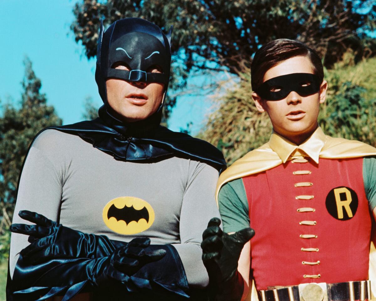 Adam West, left, stars as Bruce Wayne/Batman, and Burt Ward is Dick Grayson/Robin in the TV series "Batman" in 1966.