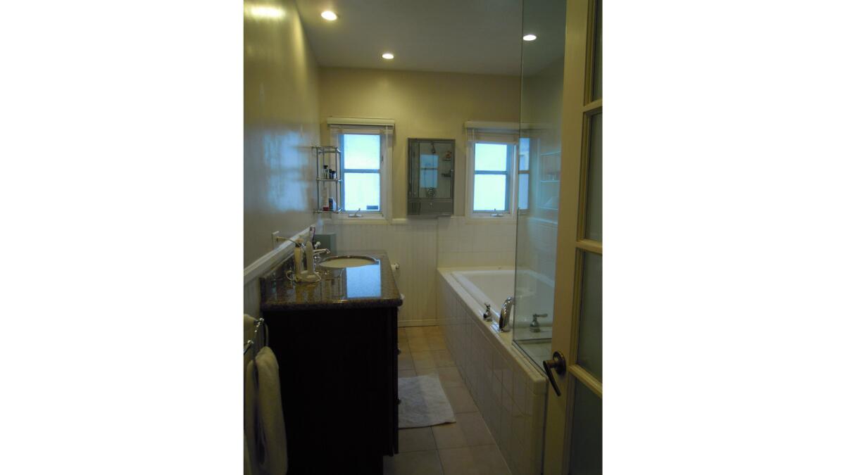Before picture of the bathroom of the home of Patrick Wildnauer and husband Tom Balamaci. (Amalia Gal)