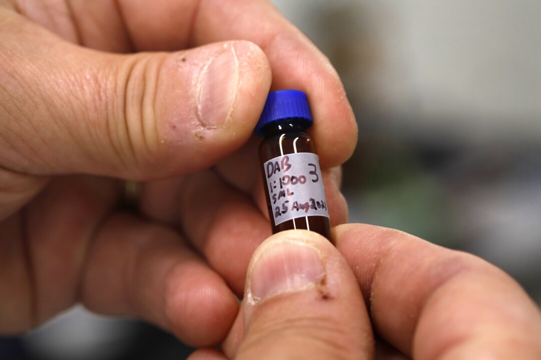 A vial of cannabis oil inside the testing lab at Biopharmaceutical Research Co.