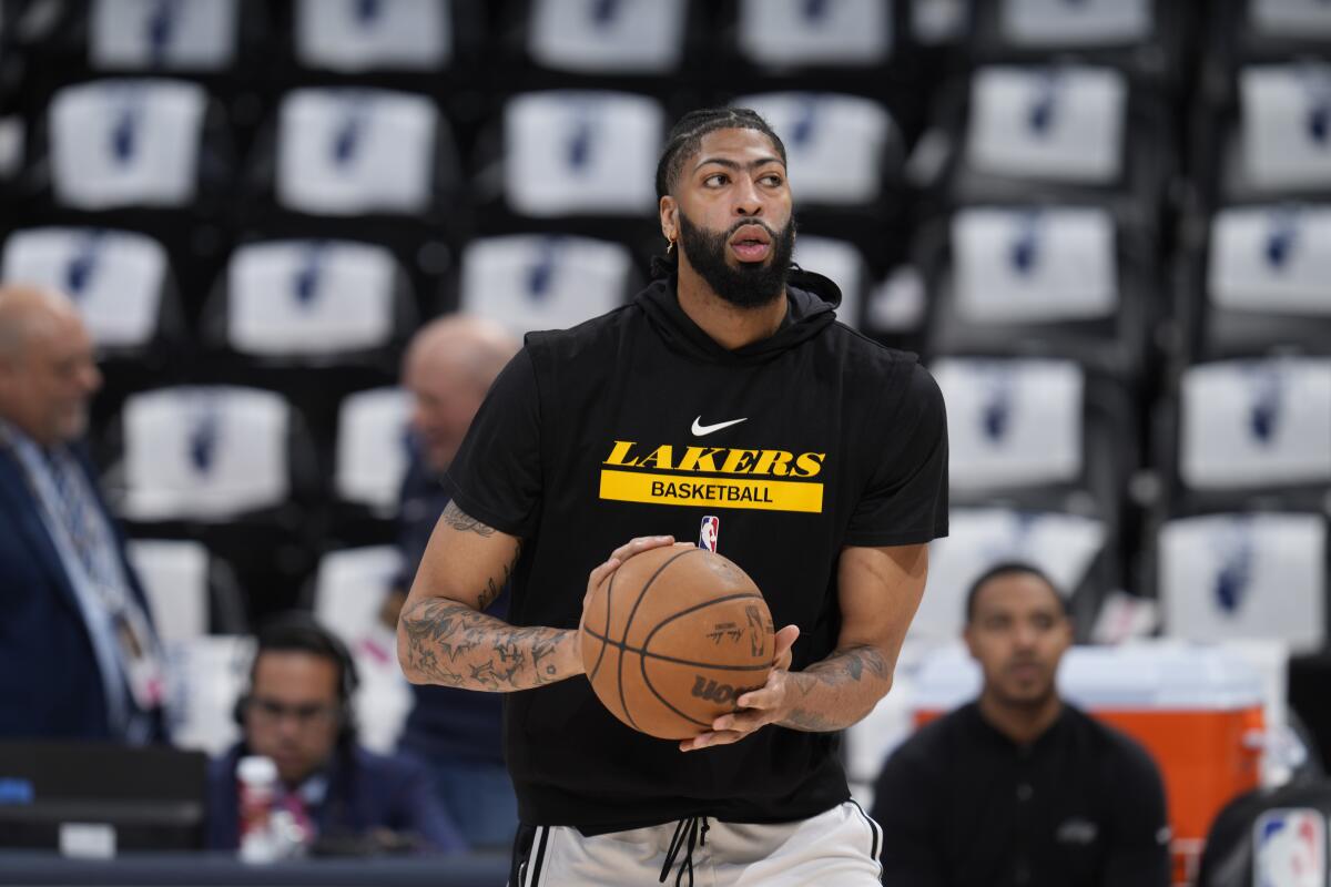 Lakers forward Anthony Davis warms up before a game.