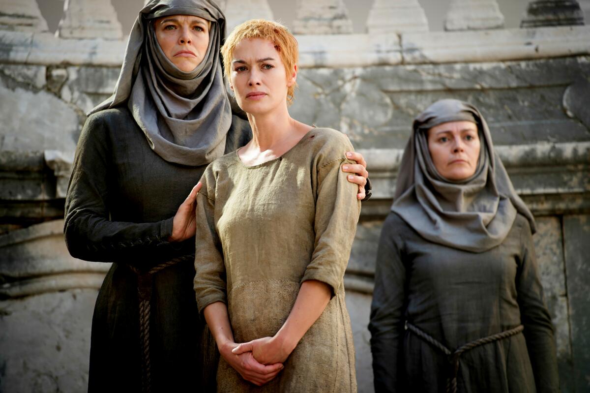 Hannah Waddingham as nun Septa Unella and Lena Headey as Cersei Lannister in "Game of Thrones."
