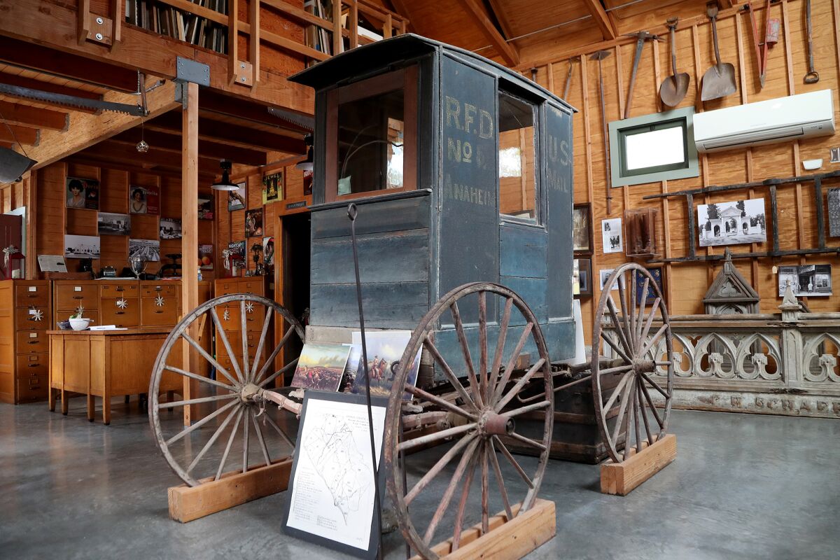A vintage Anaheim mail wagon on display at the Carriage House in Anaheim.