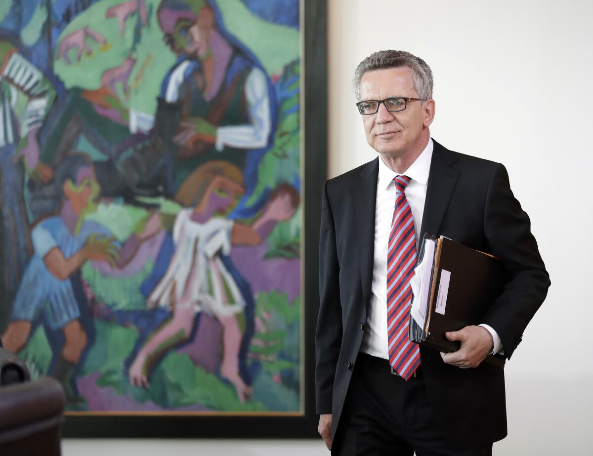 German Interior Minister Thomas de Maiziere arrives for the weekly cabinet meeting at the Chancellery in Berlin on Wednesday.