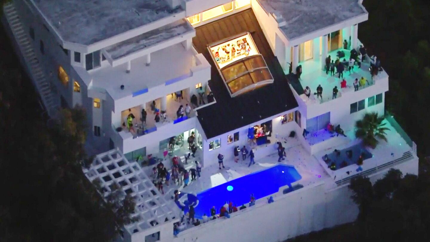 Aerial view of a large house party on Mulholland Drive in Beverly Crest