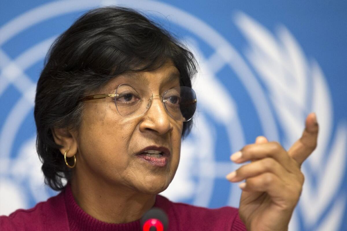 U.N. High Commissioner for Human Rights Navi Pillay speaks during a news conference at the European headquarters of the United Nations in Geneva in December. "Those detained [in Syria] must be treated humanely," she said Monday.
