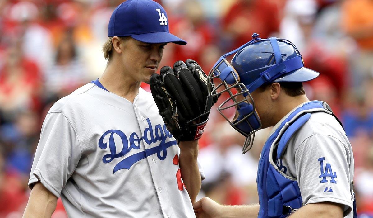 Starting pitcher Zack Greinke, talking to catcher Tim Federowicz in the fifth inning Thursday, says of the Dodgers: "People expect us to win every game."