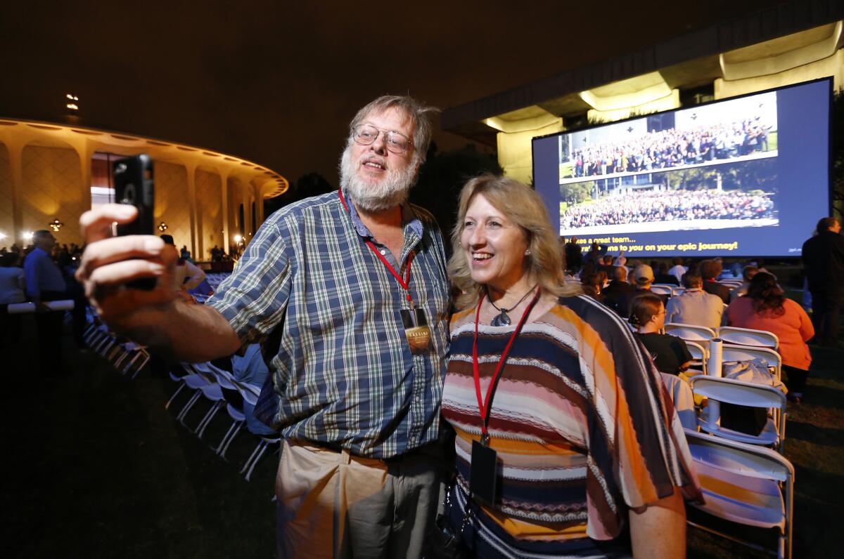 Ken Clark and his wife, Dotty, take a celebratory selfie at Caltech, where people involved in JPL's Cassini mission celebrated. (Al Seib / Los Angeles Times)