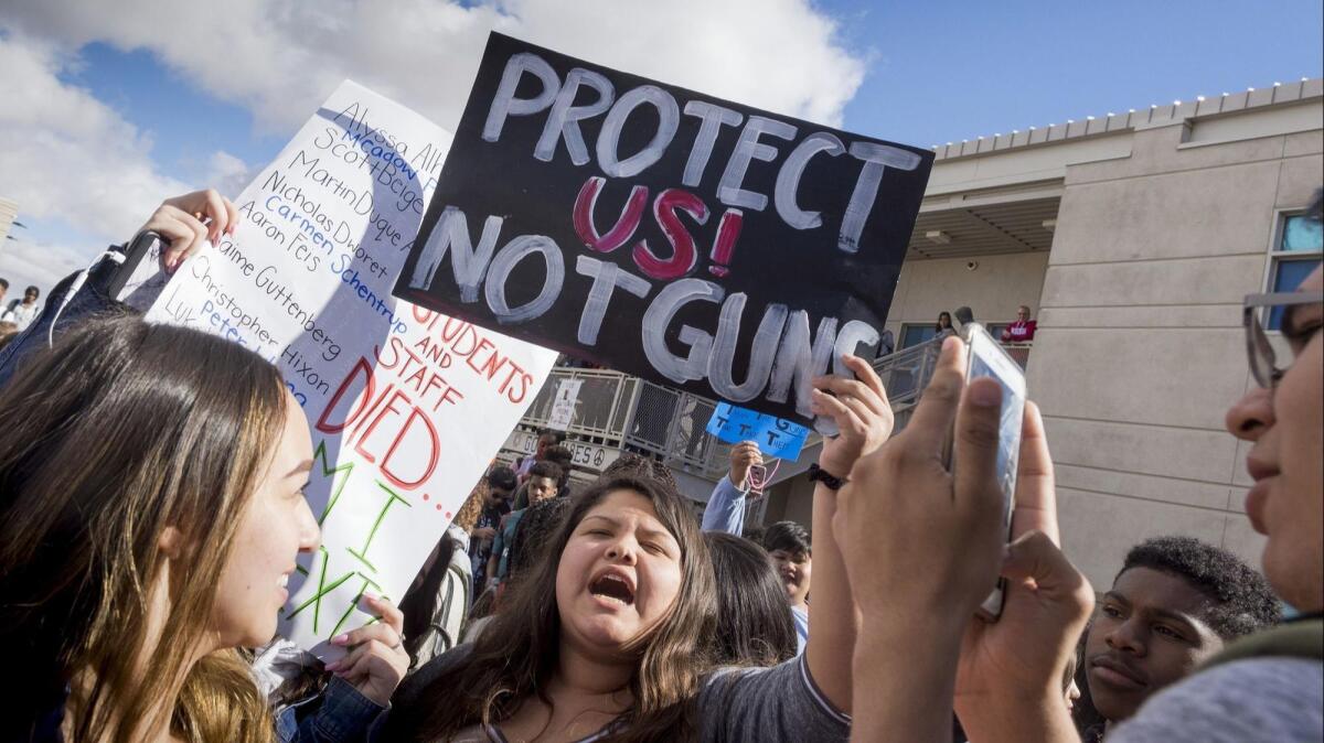 LOS ANGELES, CA - MARCH 24, 2018: Students lead a chant against gun violence as thousands of protesters marched in the streets for March for Our Lives on March 24, 2018 in Los Angeles, California.