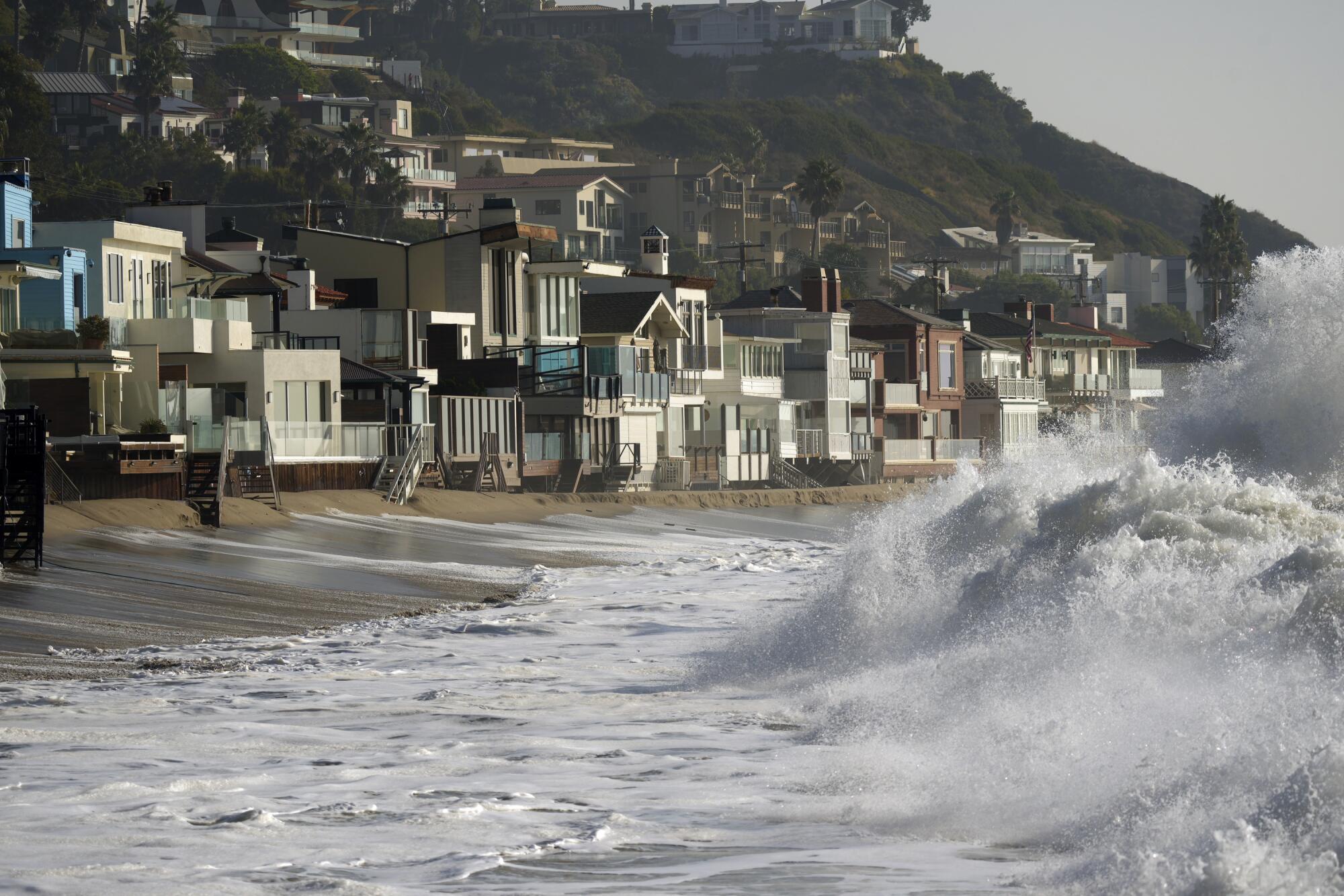 December 2023 photo of waves near beach homes in Malibu.