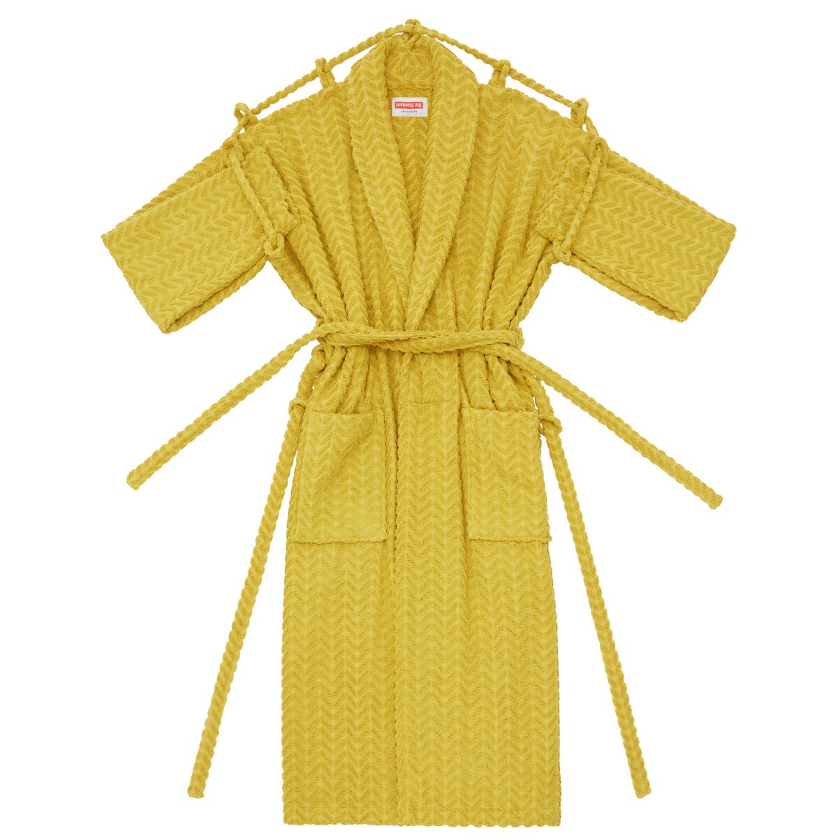 A photo of a woven terry jacquard robe with two belts from the Standard and Craig Green.