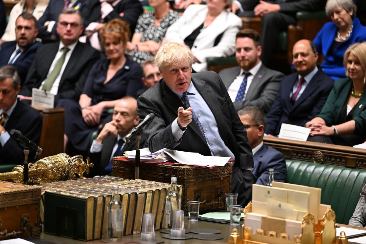 In this photo provided by UK Parliament, British Prime Minister Boris Johnson speaks during Prime Minister's Questions in the House of Commons, London, Wednesday, June 15, 2022. (Jessica Taylor/UK Parliament via AP)