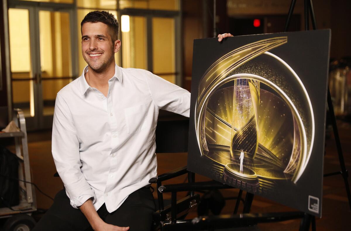Oscars show production designer Jason Sherwood shows a rendering of his design for the stage.