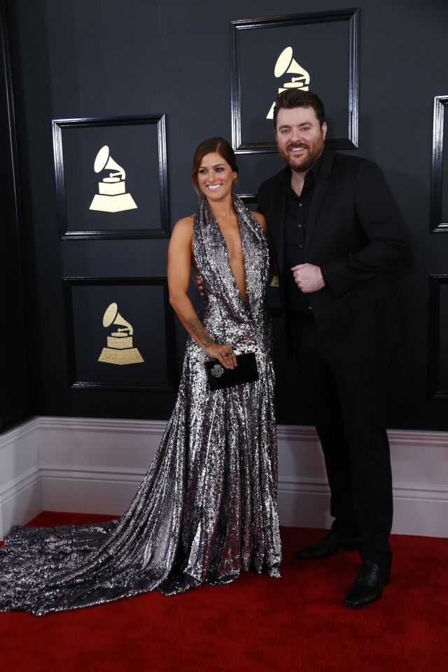 Cassadee Pope and Chris Young arrive at the 59th Grammy Awards.