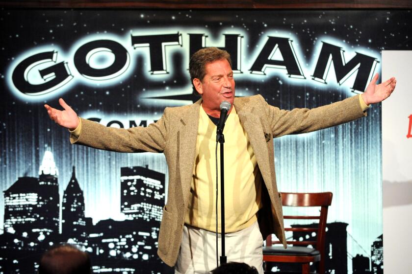 Comedian Hiram Kasten performs onstage in 2013 in New York City.