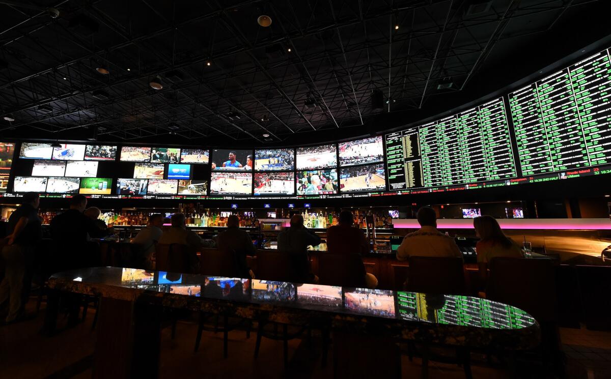 The betting line and some of the nearly 400 proposition bets for Super Bowl 50 are displayed at the Race & Sports SuperBook at the Westgate Las Vegas Resort & Casino on Feb. 2.