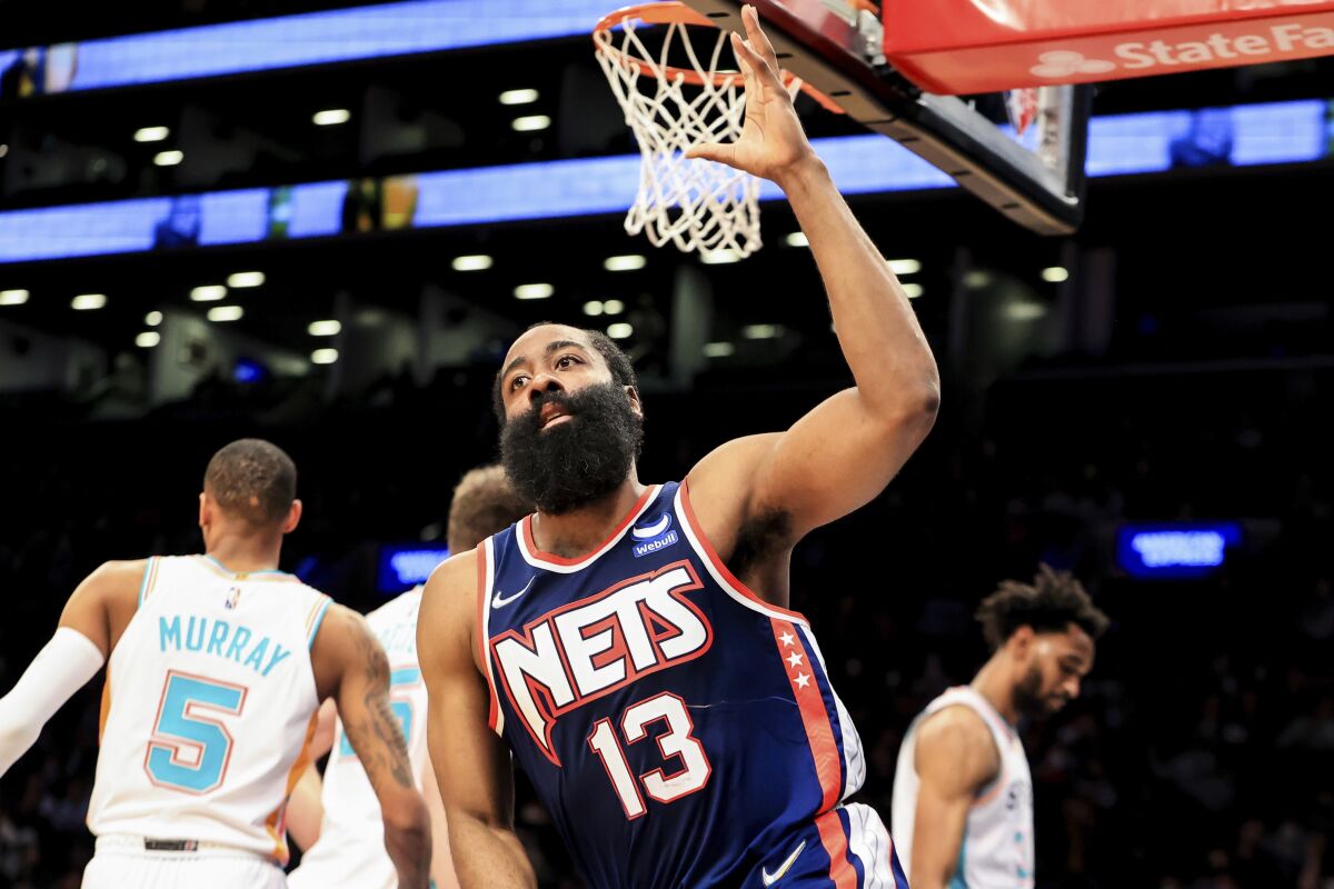 Brooklyn Nets guard James Harden (13) celebrates after his basket against the San Antonio Spurs during the second half of an NBA basketball game, Sunday, Jan. 9, 2022, in New York. (AP Photo/Jessie Alcheh)