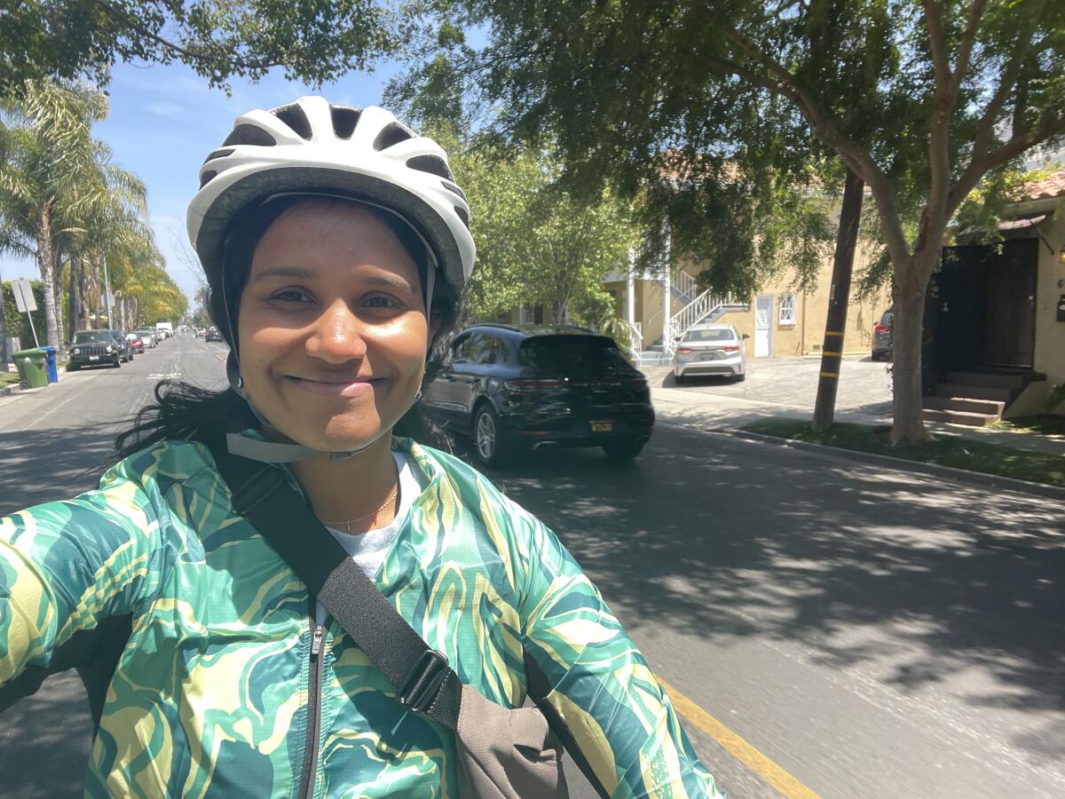 Lavanya Sunder riding her electric bike around Los Angeles.