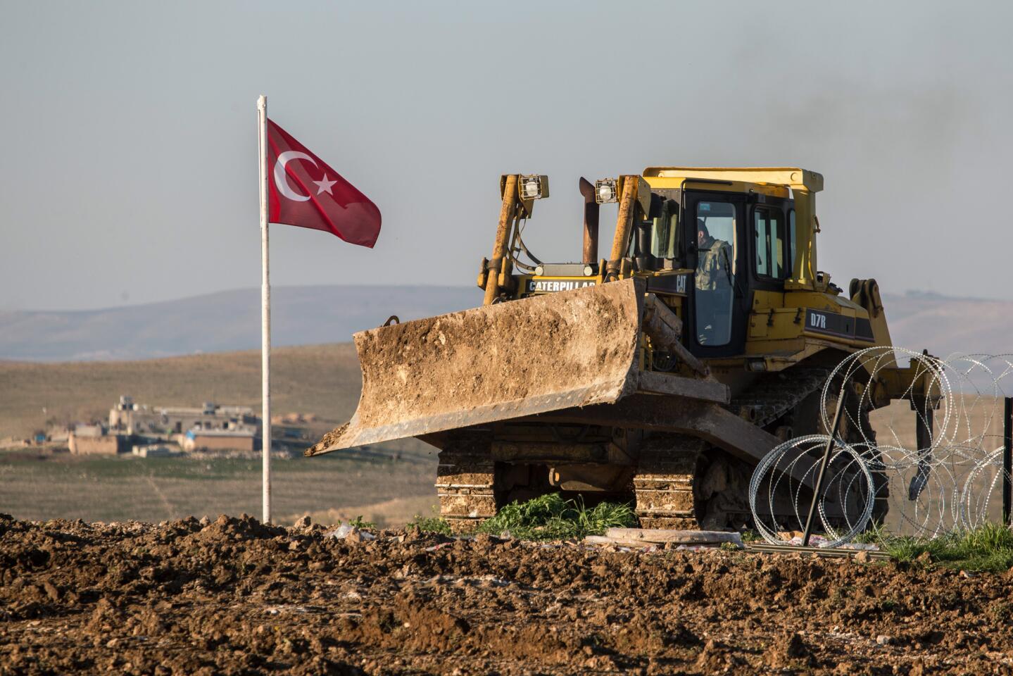 Turks work to build a new Ottoman tomb in Esme village in Aleppo province, Syria. Turkey launched an overnight military operation into neighboring Syria to evacuate troops guarding an Ottoman tomb and to move the crypt to a new location.