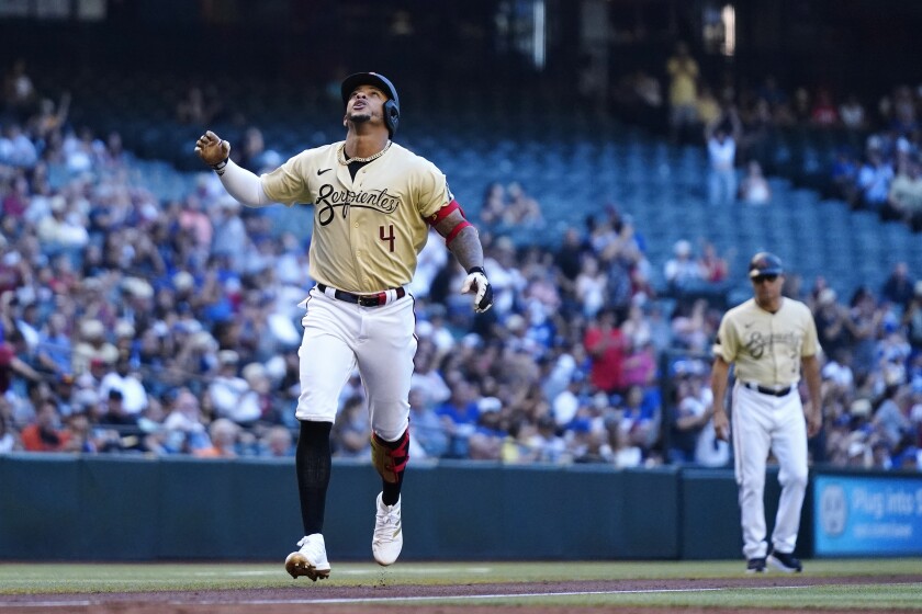Arizona's Ketel Marte celebrates after hitting a solo home run off Clayton Kershaw's first pitch.