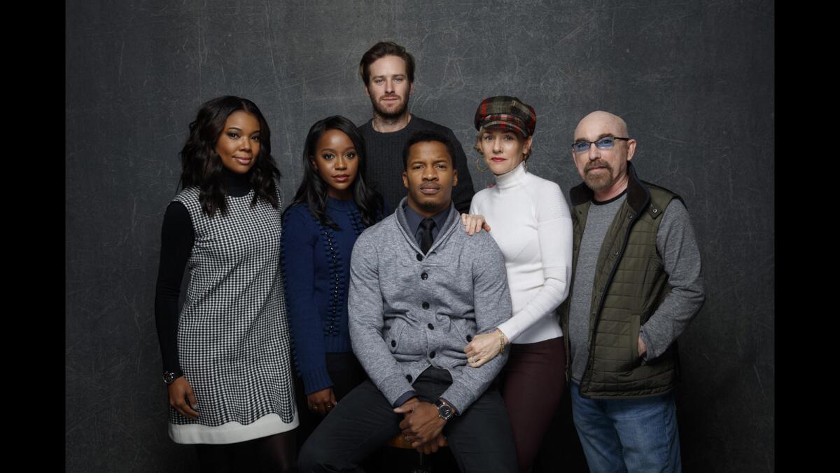 Gabrielle Union, left, Aja Naomi King, Armie Hammer, director Nate Parker, Penelope Ann Miller and Jackie Earle Haley from the film "The Birth of A Nation."