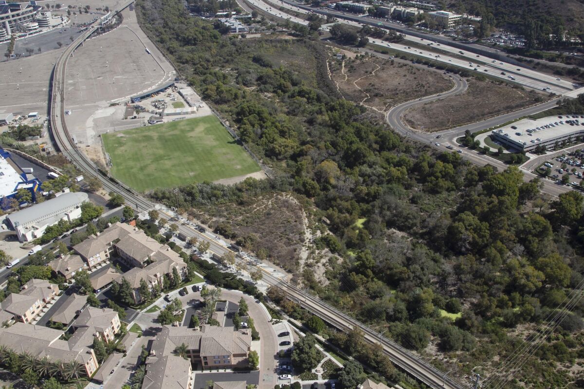 View looking south with Fenton Parkway in the middle left heading towards the San Diego River near SDSU 