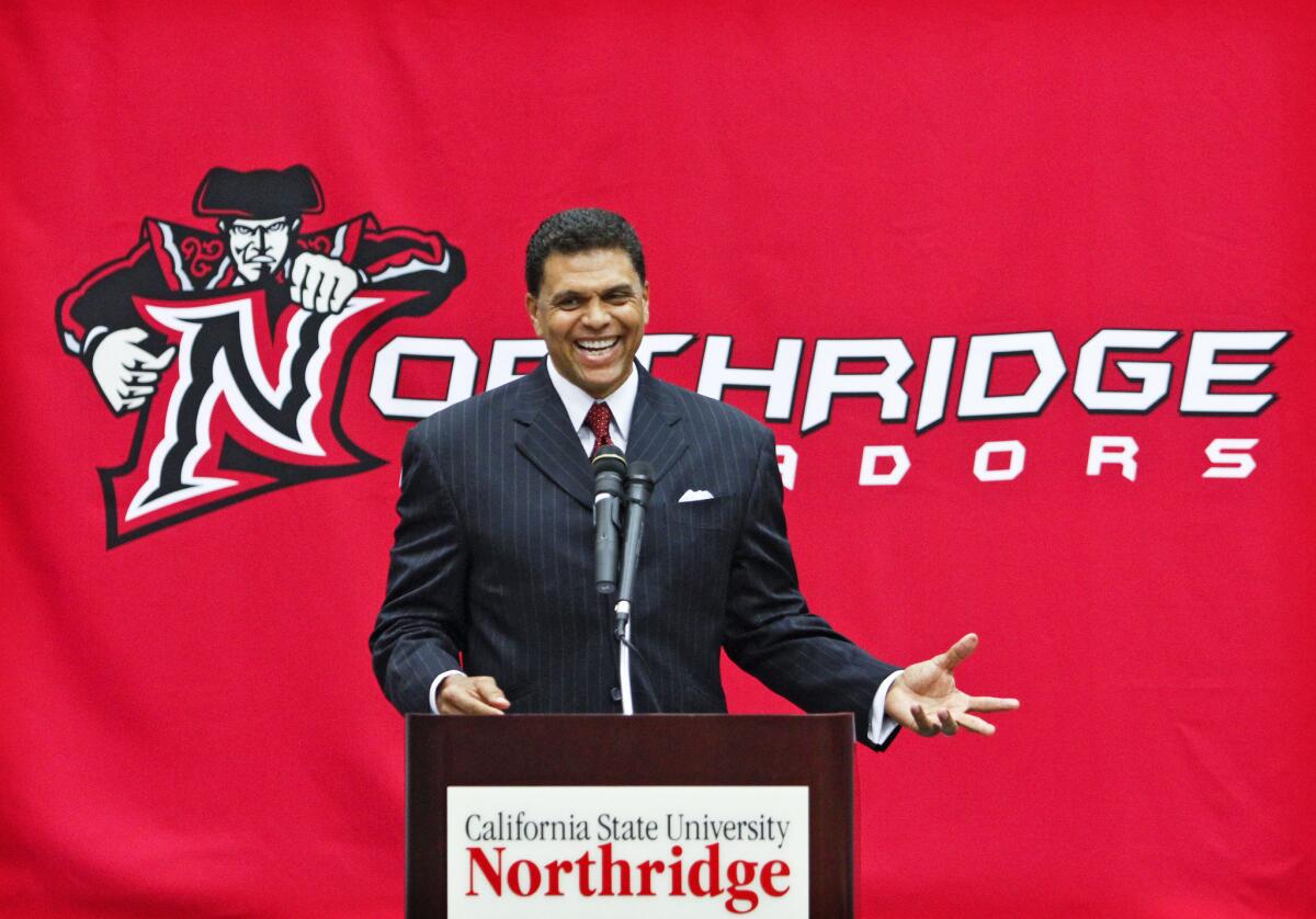 Reggie Theus, a former NBA player and coach, at his introduction as California State Northridge's basketball coach at the CSUN's Matadome in 2013.