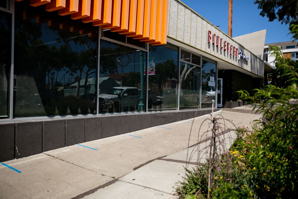 The doors were open at Boulevard Fitness but there was no socially-distanced line out front on Tuesday.