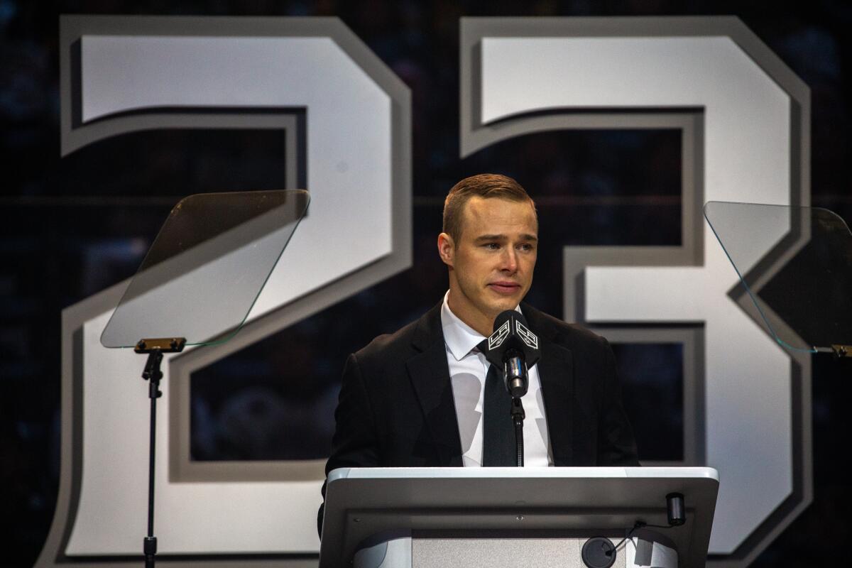 Dustin Brown speaks at an event to retire his Kings number.