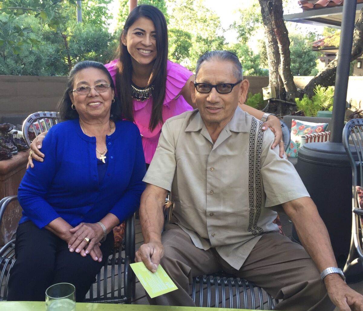 Elsy Guardado with her parents, Argelia Guardado and Baudilio Guardado.